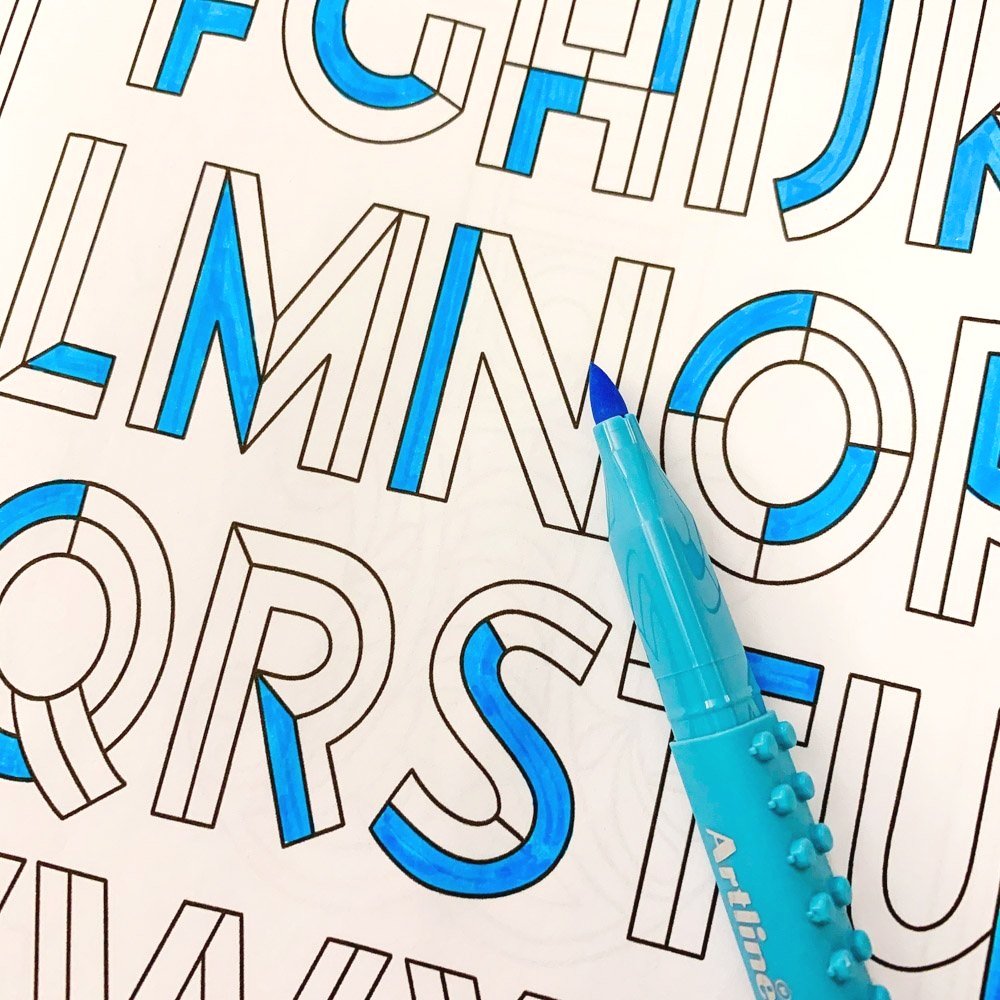 Colored geometric alphabet with blue marker from Decorative Alphabets Coloring Book by Molly Suber Thorpe