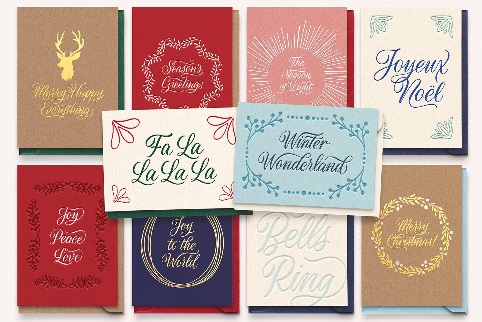 A display of mock. up Christmas cards made using the Merry Christmas Calligraphy Vector Pack by Molly Suber Thorpe