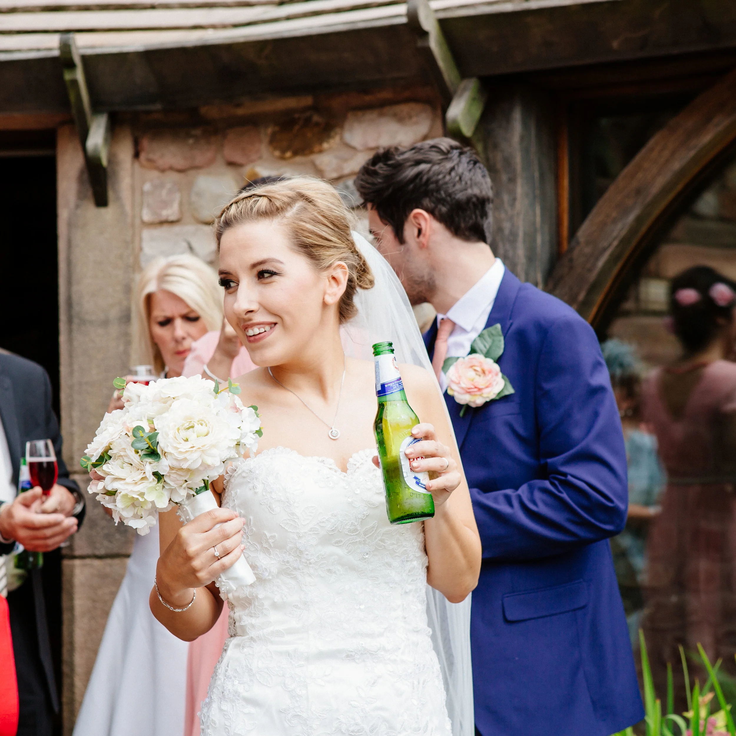 Bride drinking beer