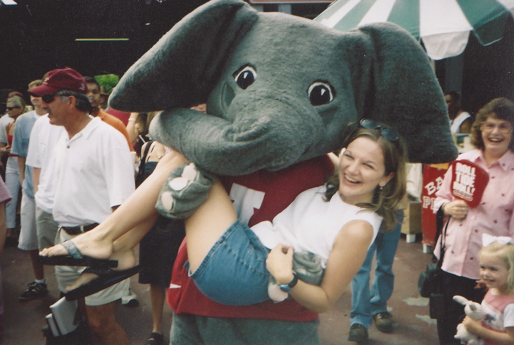 In college Jason (my husband) was the mascot. I think this is our best picture together ;)