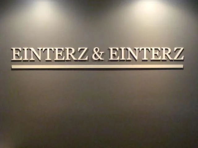 Einterz & Einterz Metal Sign