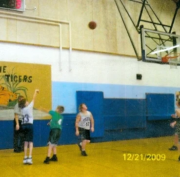 Tate Yoder ('10) shoots from downtown. Tate will attend Northeast Basketball School in Bangor.