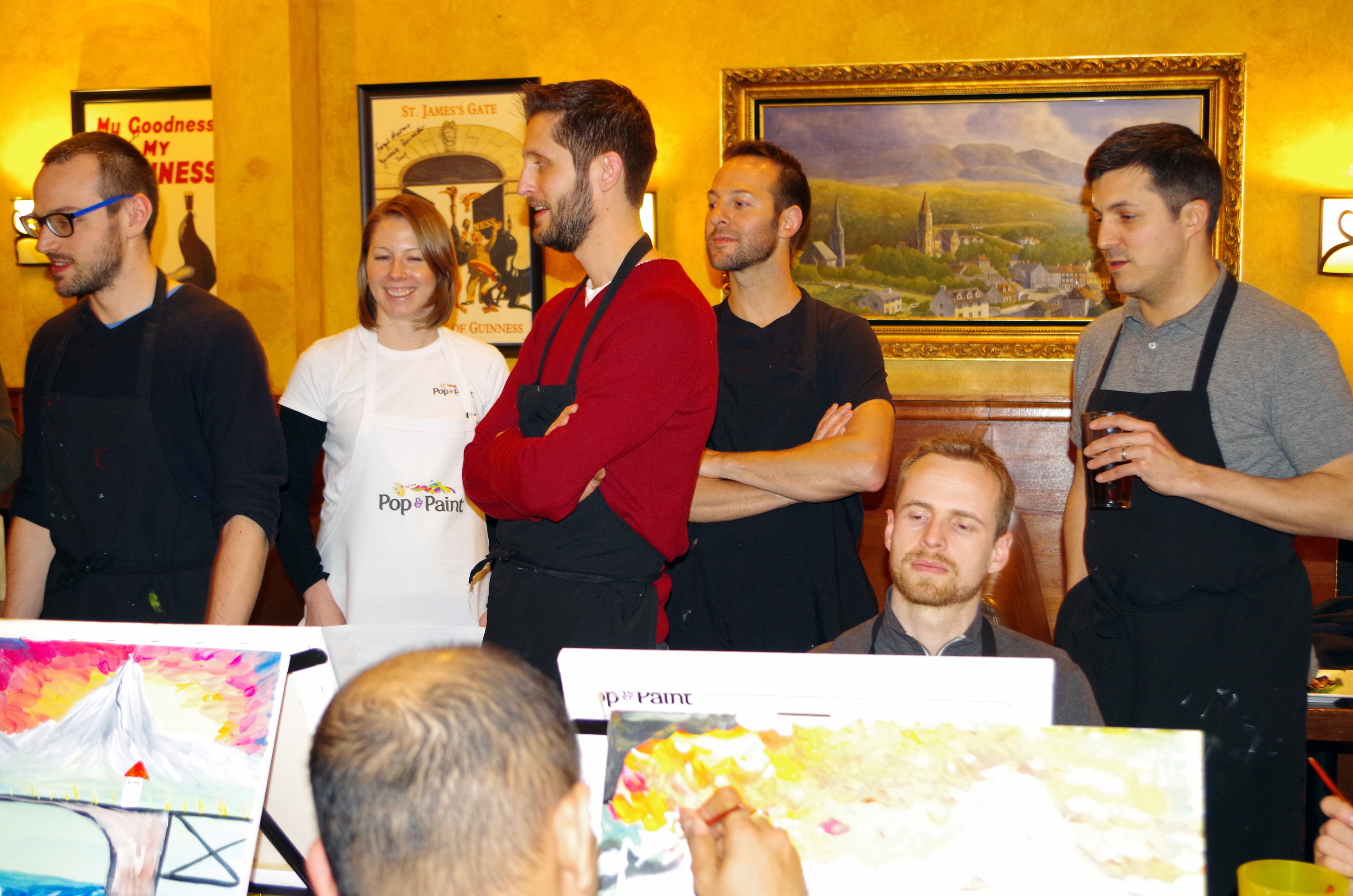  Checking out everyone's paintings 