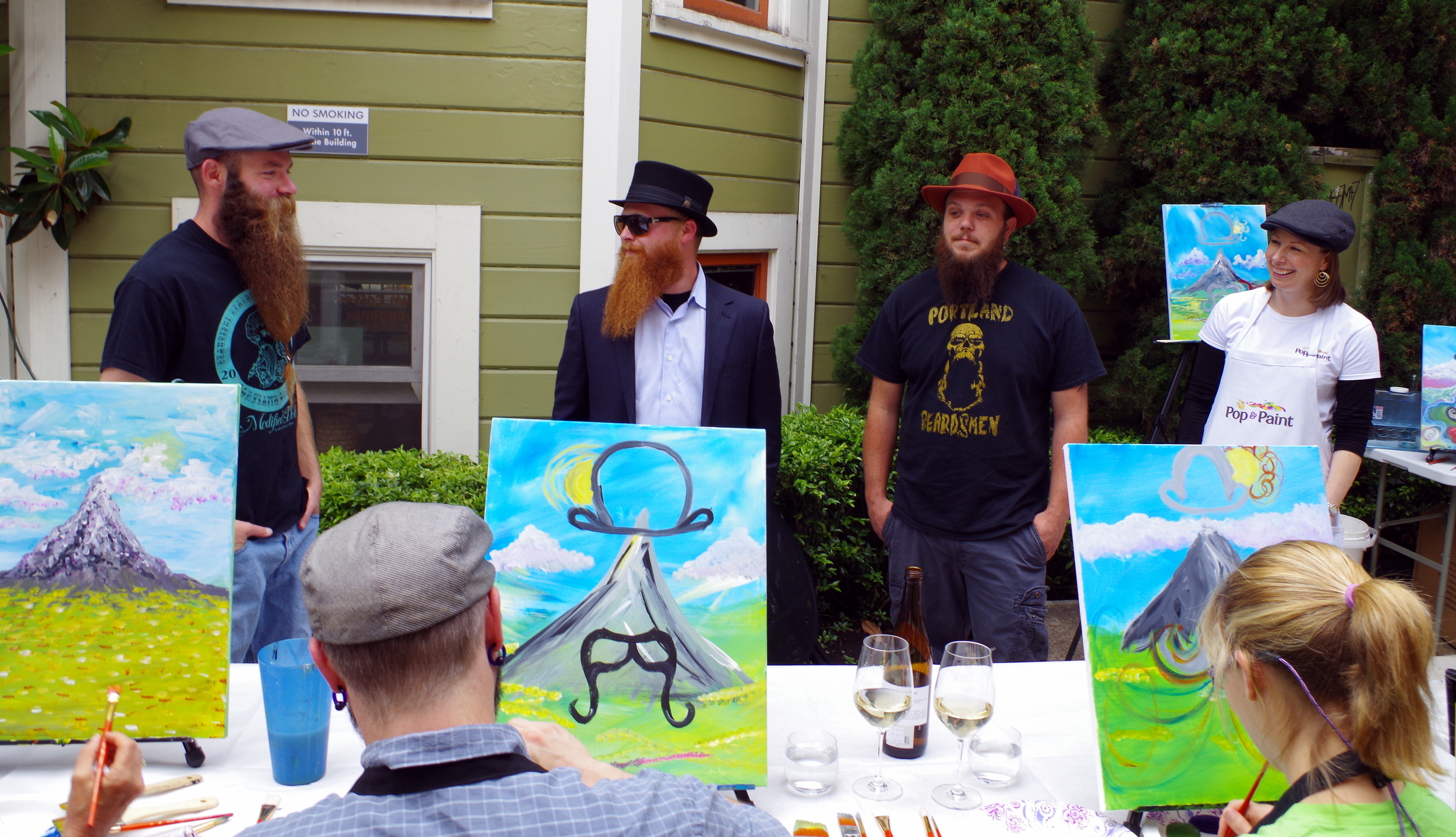 Angie, owner of Pop & Paint, chatting with the Portland Beardsmen!