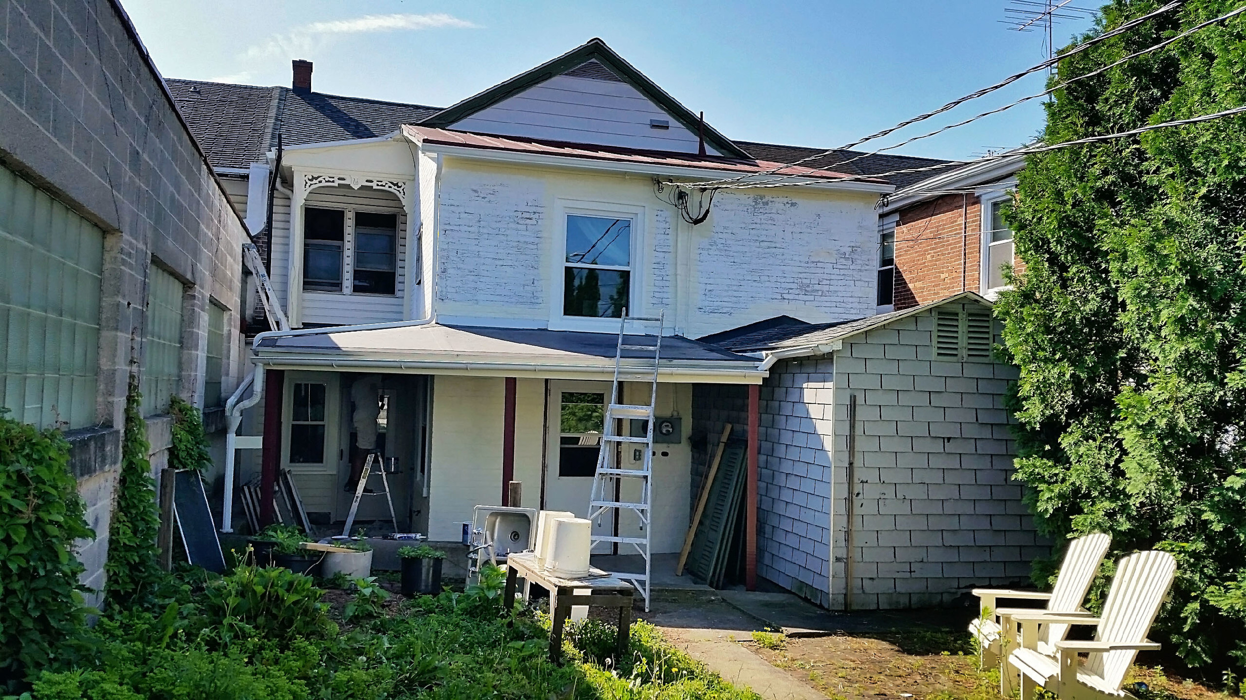New gutters and downspouts in place and starting on the back of the property.