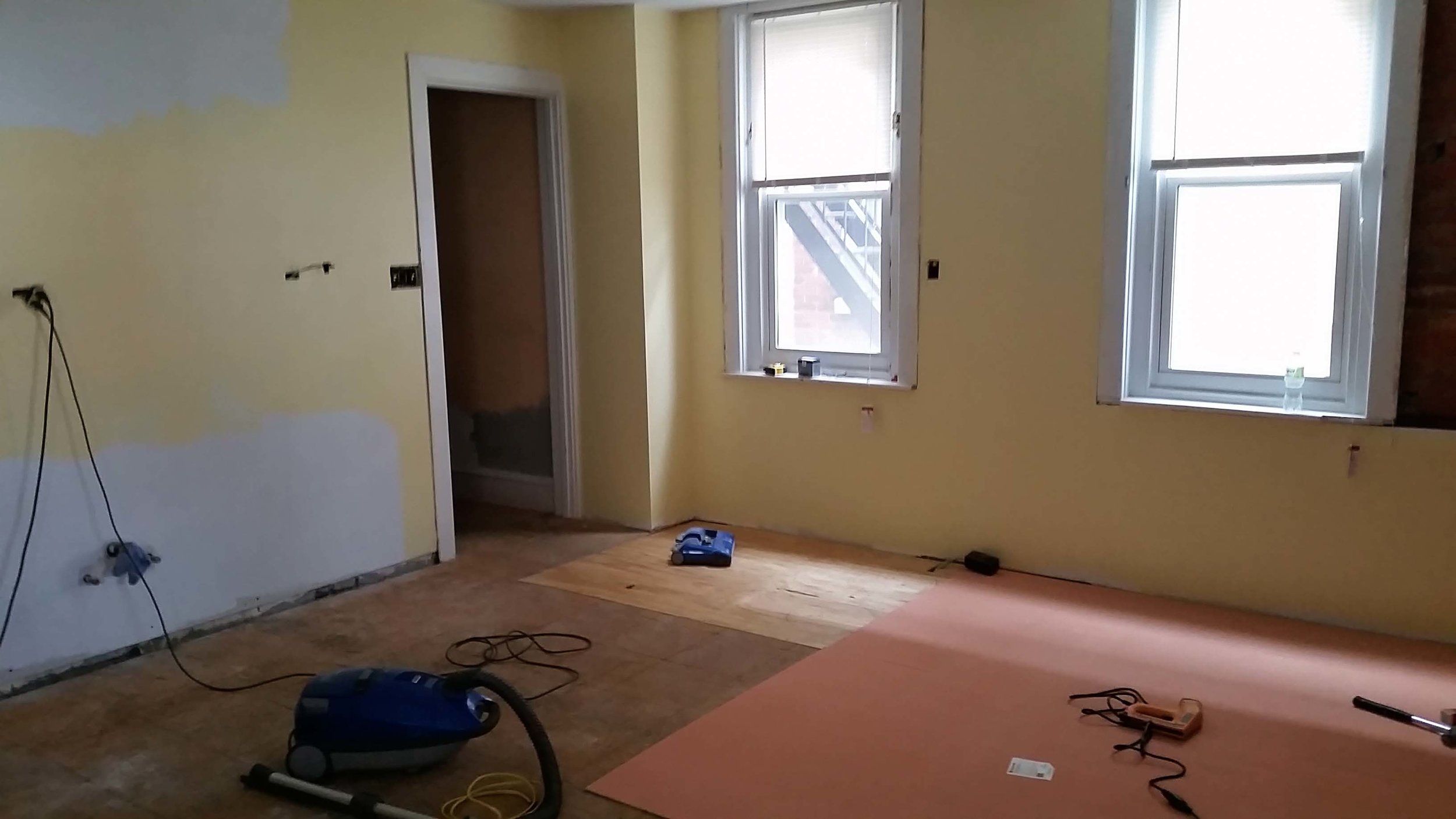 Two areas of sub-flooring was starting to rot so it was replaced. Another thin layer of smooth flooring over that and the finished floor can by laid.