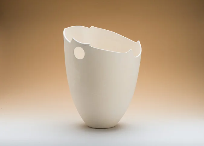 White tall vase brown background 2.jpg