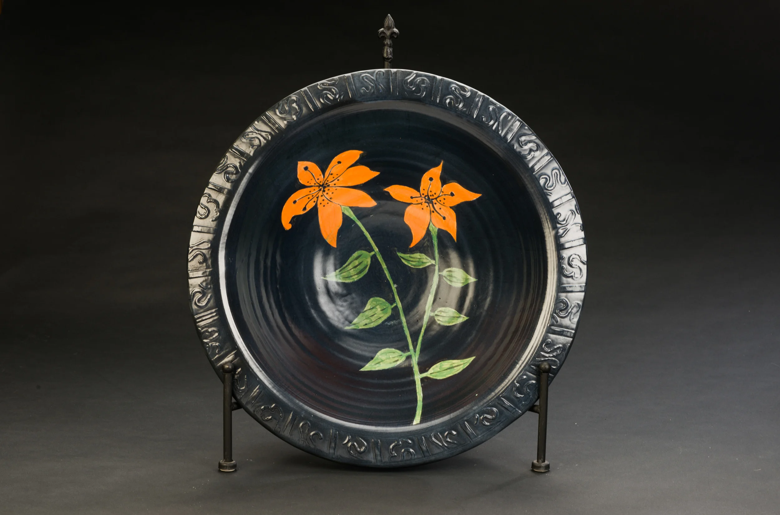 Slap-made bowl with floral design, circa 2007.