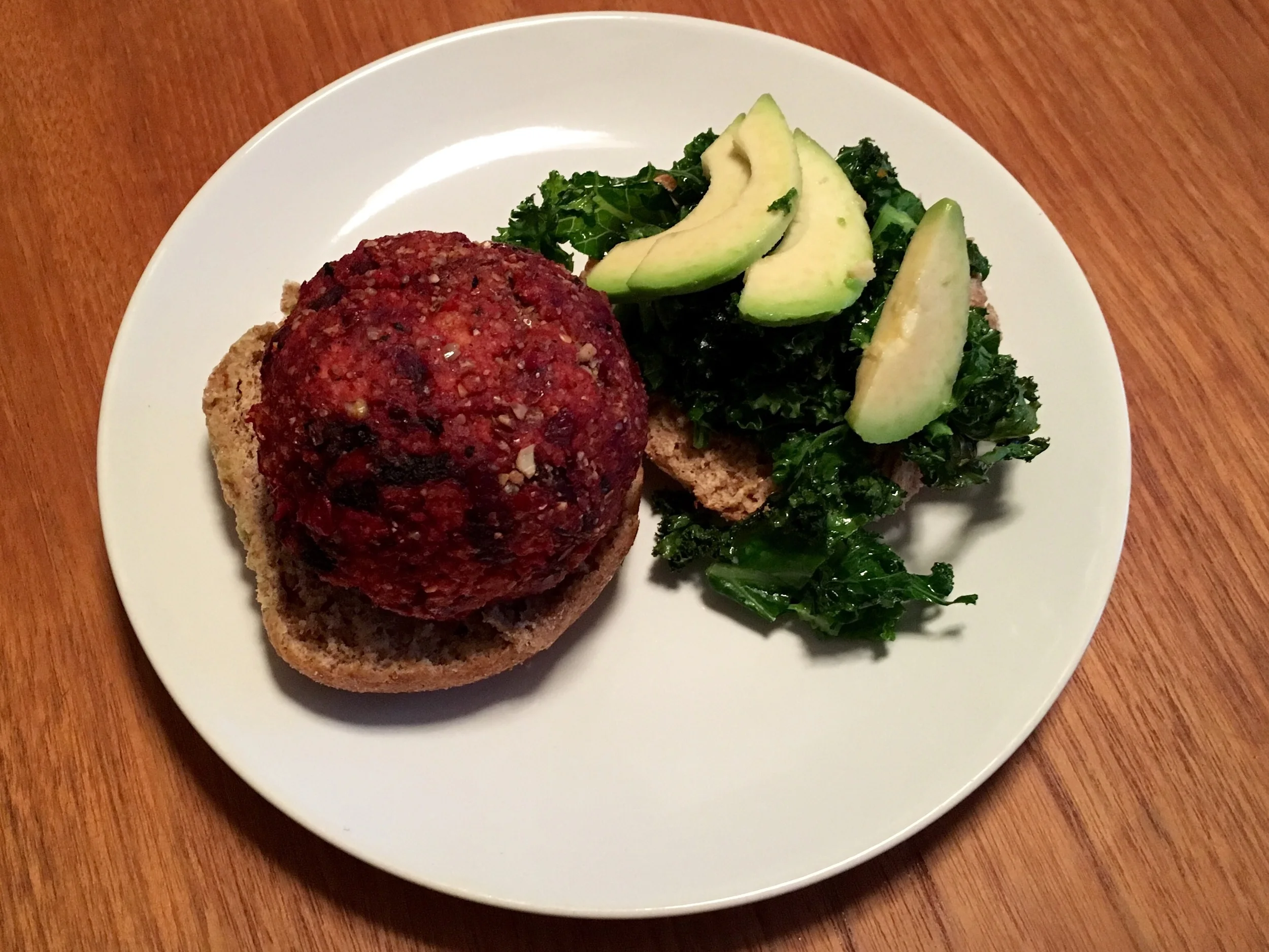 Served (w) a little kale & avocado salad on a wholemeal bun.