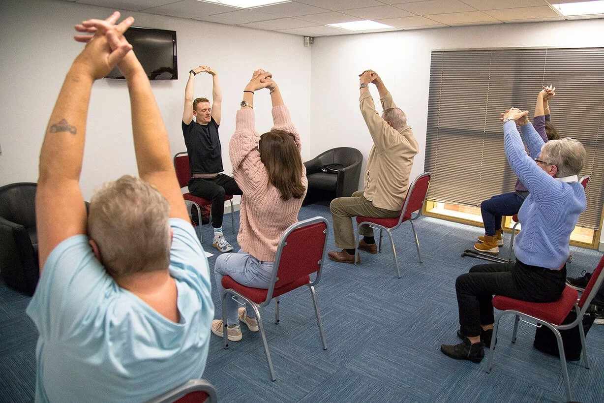 Fitness Belfast Belfast Trust Forward South Chair Yoga Workshop Group Stretch.jpg