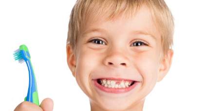 kid-with-toothbrush-620x350.jpg