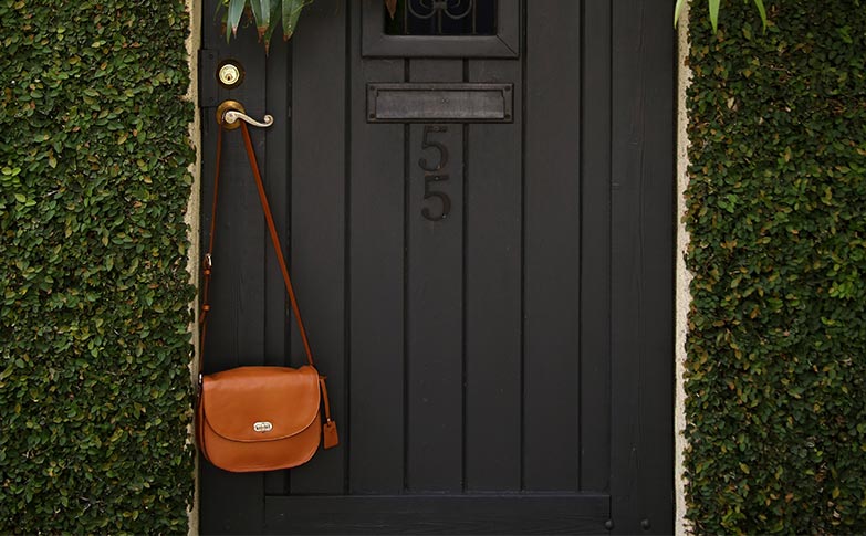 leather-purse-camera-bag-lo-and-sons-1.jpg