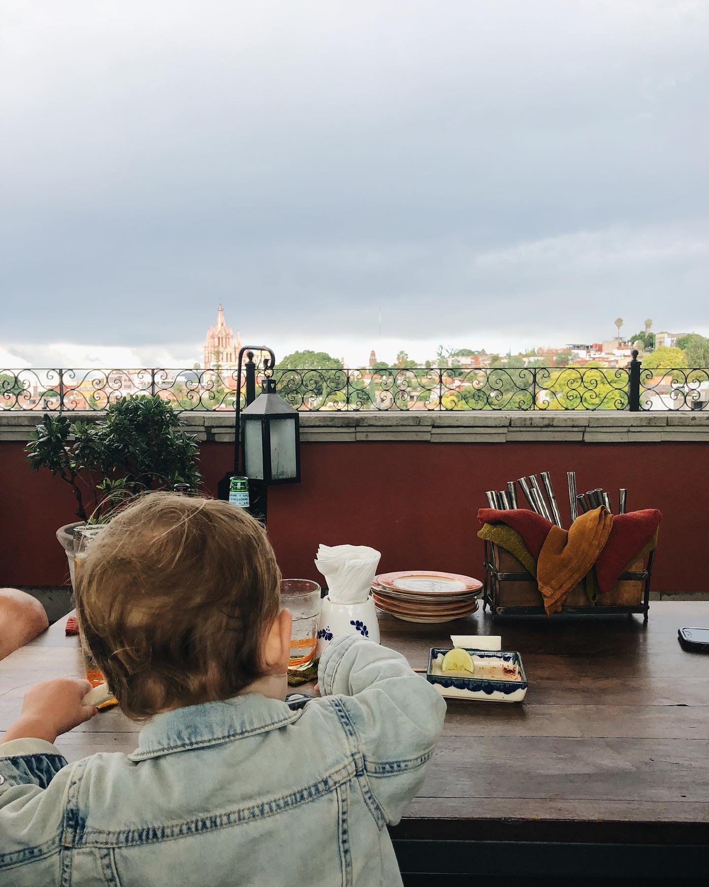 Travel with a toddler 101: make eating a main event. Or the only event. Pick one place a day you want to eat at and get there. Only there. Everything else is extra. 

Not only does this alleviate stress from dragging everyone around town, but you als