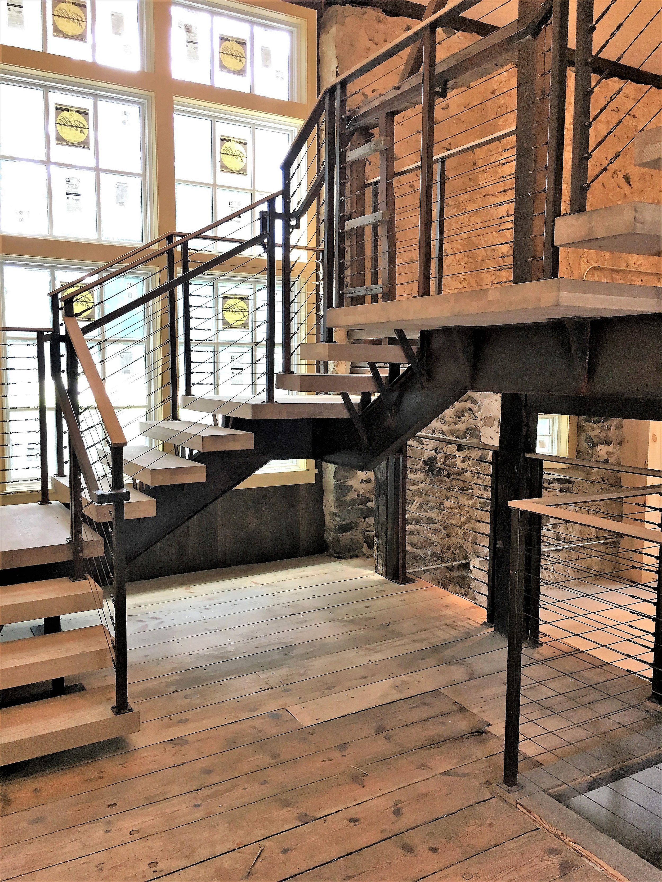 Barn - floating staircase with open risers.JPG