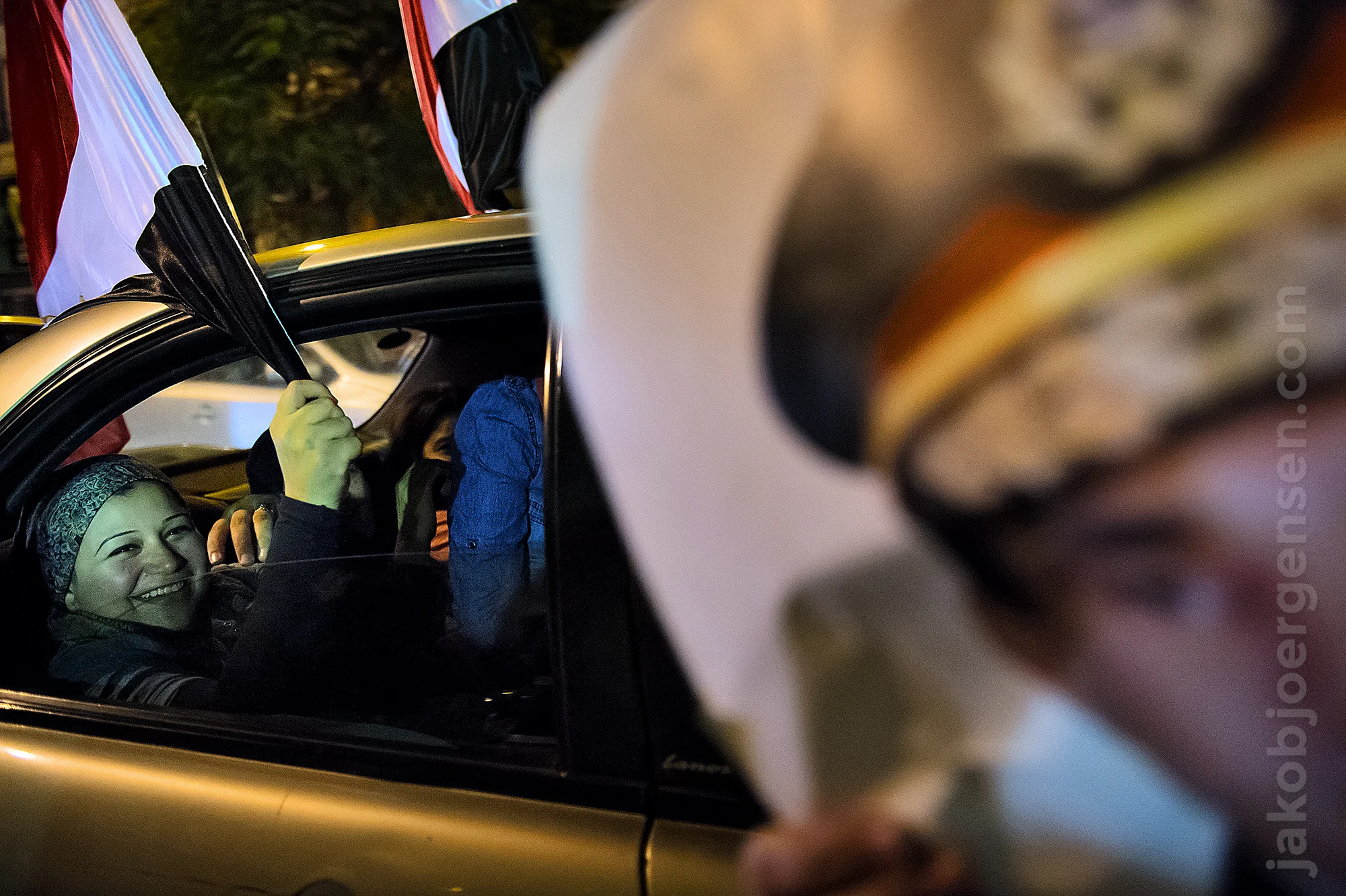 Anti-Mursi people celebrate the military take over. July 2013.