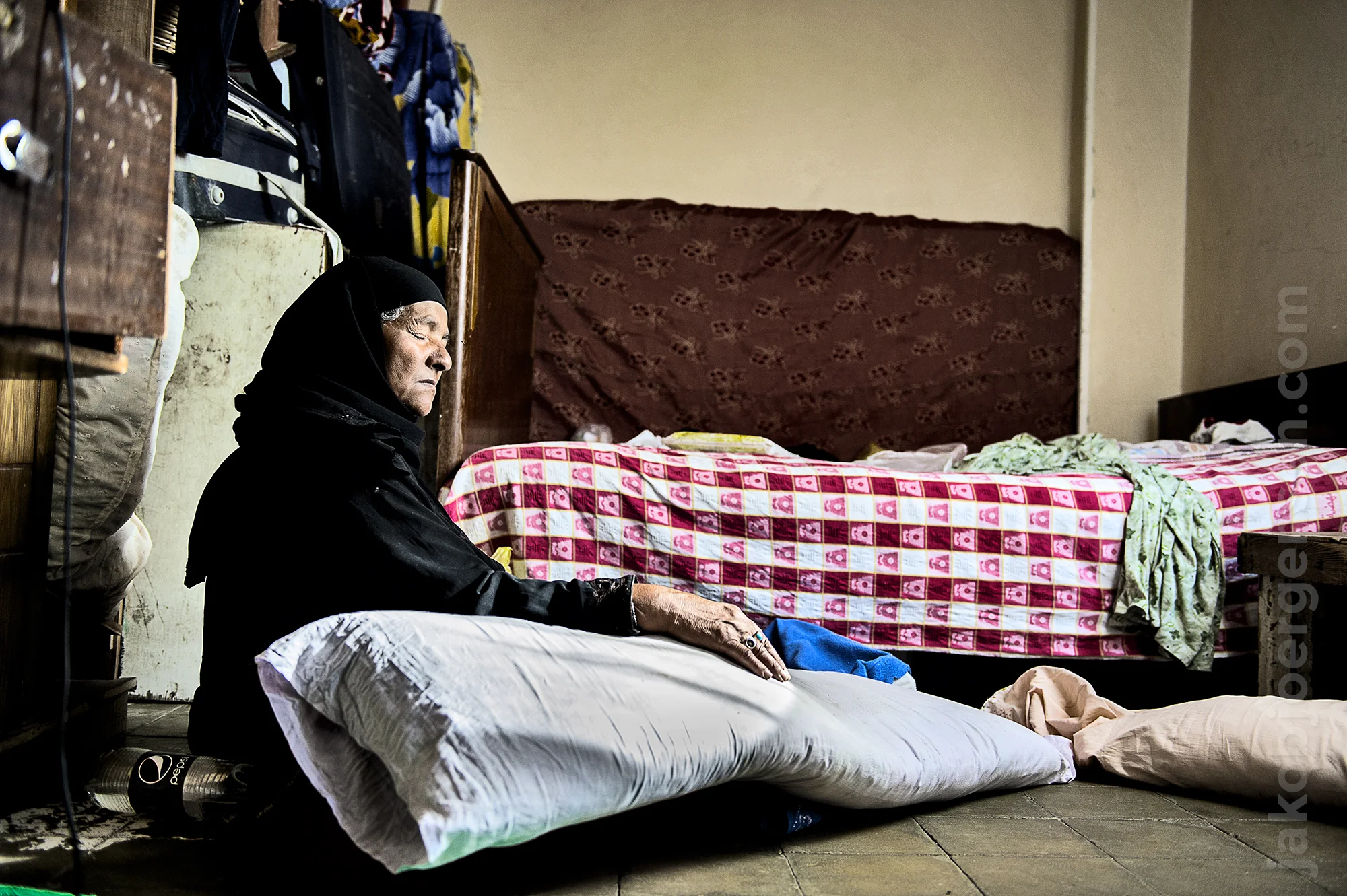 Mother who lost 3 sons. 2 of them in the revolution. The last one was killed 6 days before this photo by The Muslim Brotherhood, while he was trying to save a friend, who had been shot in the leg. Her family now have no income and rely on support from charity, family and friends. July 2013.