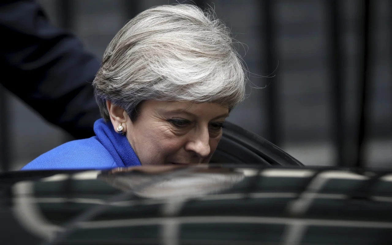 Theresa May leaving Downing Street following her statement on the election result (New Statesman/GETTY IMAGES)