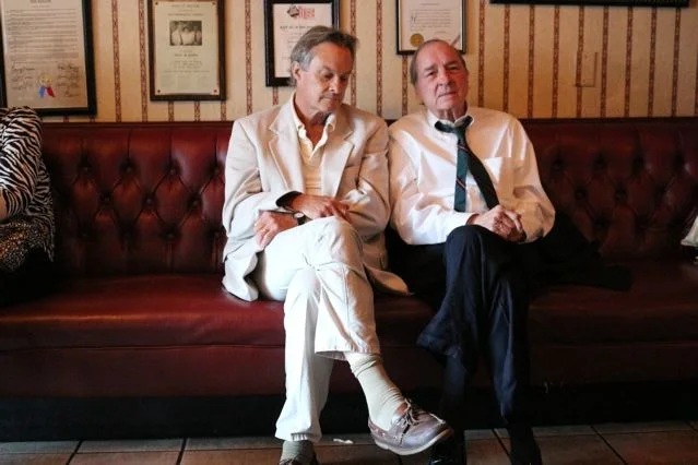Langdon Clay sitting with William Eggleston. Photo by Maude Clay.