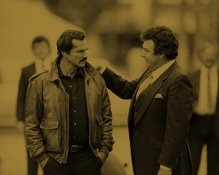 Burt Reynolds with co-star Joseph Mascolo on the set of Sharkey's Machine