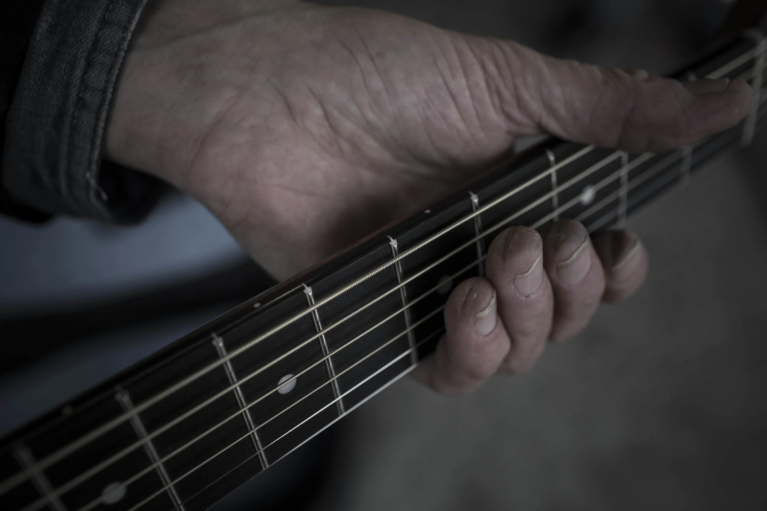 Over the decades, Doug Seegers has developed thick guitar-string calluses on his fingertips.