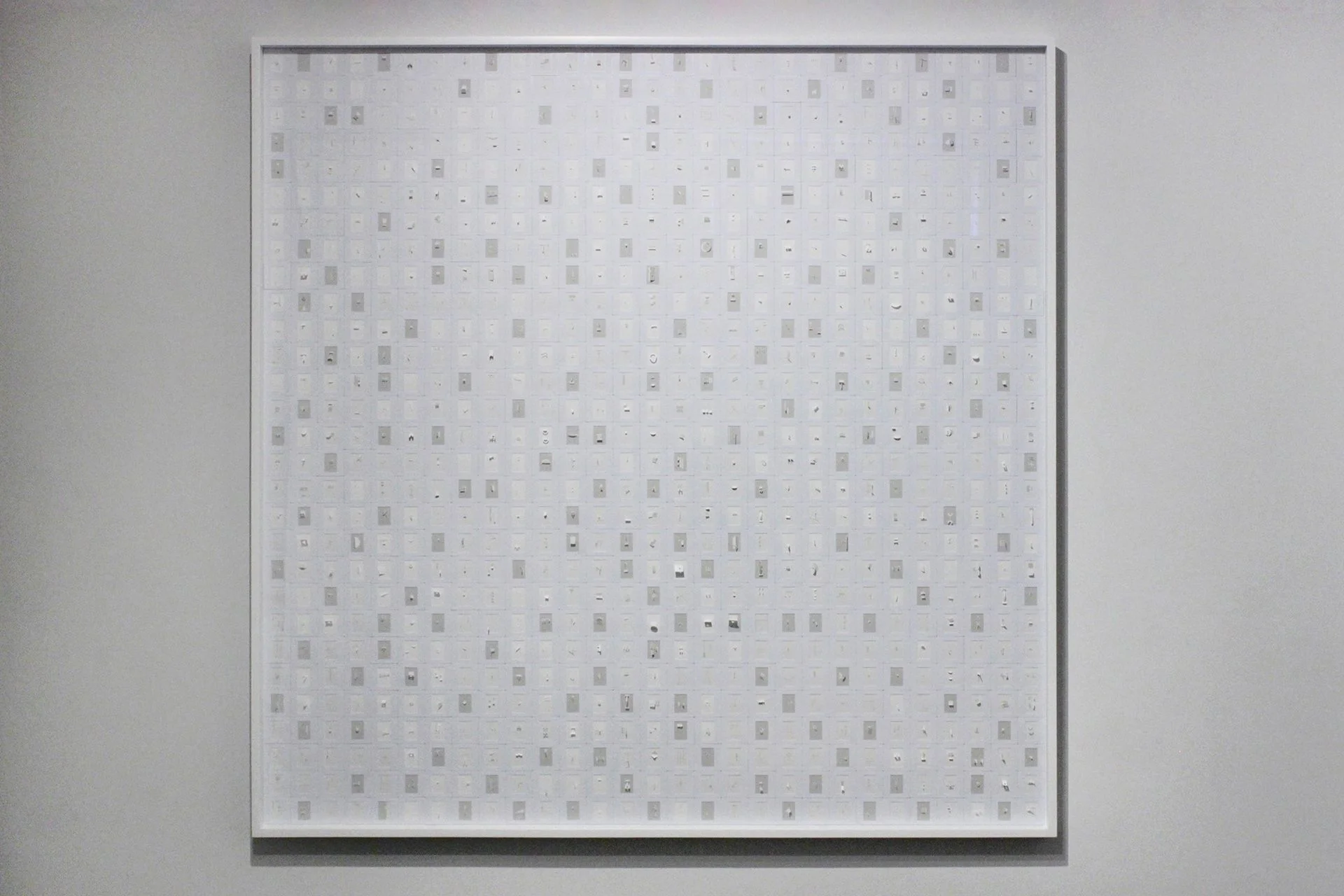 MARCO MAGGI SPELLING SQUARE (G & W), 2016 CUTS AND FOLDS ON 841 WHITE AND GREY ARCHIVAL PAPERS IN 35MM SLIDE MOUNTS ON SINTRA 59 X 59 INCHES, 60 X 60 INCHES FRAMED MM229