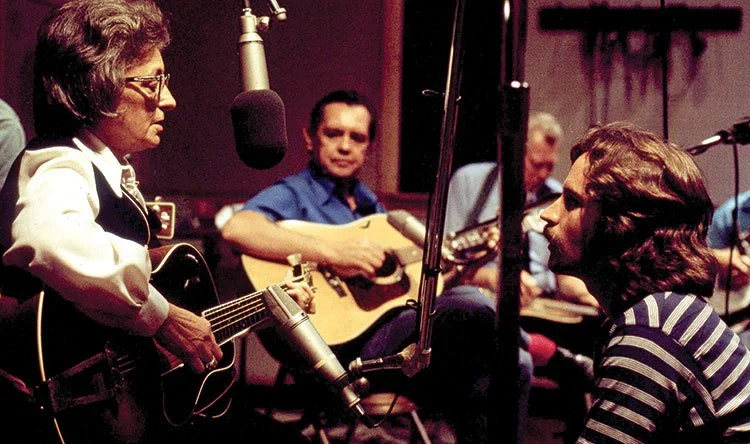 Mother Maybelle Carter in the studio with Jeff Hanna (at right) in 1971. When this picture was made, Carter was 62, and Hanna was 24. This summer, Hanna will turn 70.