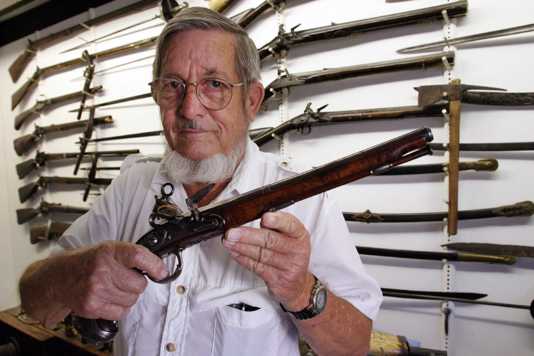 JACK WILLIAMS WITH PISTOL 2003, Photo by WALTER COKER
