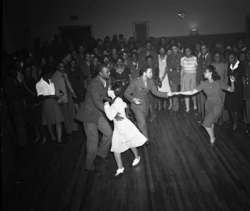 Lindy hopping in Atlanta, Georgia. Probably a United Service Organization (USO) dance, 1943. Photo courtesy of Lane Brothers Commercial Photographers Photographic Collection, Special Collections and Archives, Georgia State University Library.