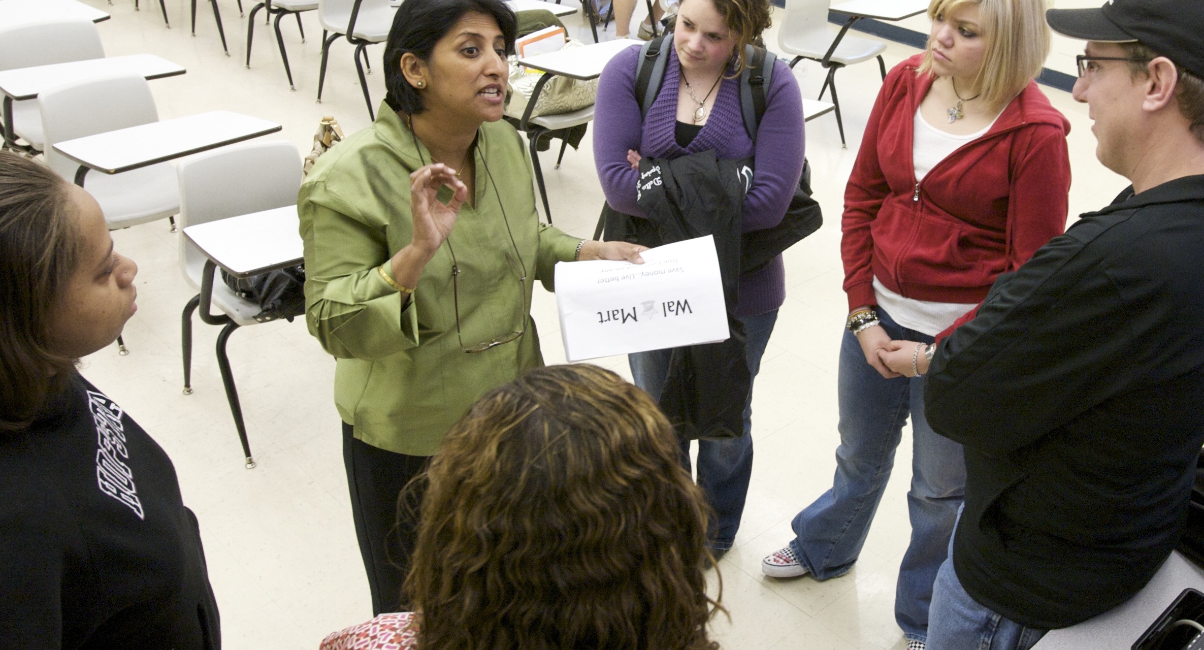 Margaret Abraham has been teaching at Hofstra University since 1990. Pictured here with some of her students.