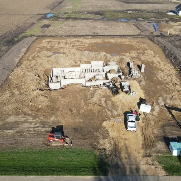 Things are moving so fast that I can't even keep up the 'gram! These are from 4/16. They were working on removing the foundation forms. I was trying to keep my kid from falling down in the mud and into the hole. 🙃

➡️ Swipe through to see the pool I