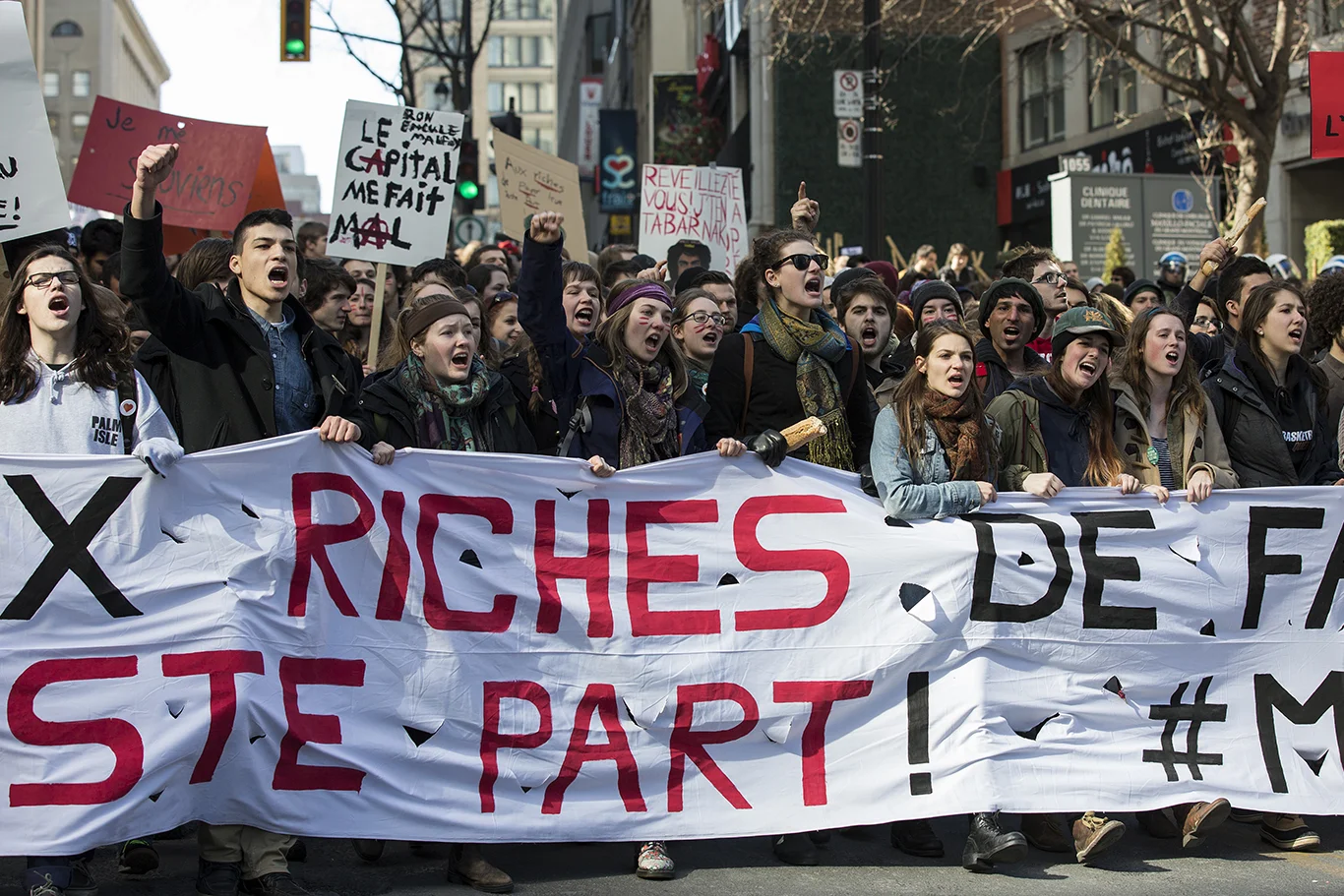 MONTREAL, QC. APRIL 3, 2014 -- A student demontration against the Parti Québécois government's proposed austerity budget wound its way through downtown Montreal on Thursday, April 3, 2014. The protest was organized by the ASSÉ student association. (Leslie Schachter/Journal Métro) 