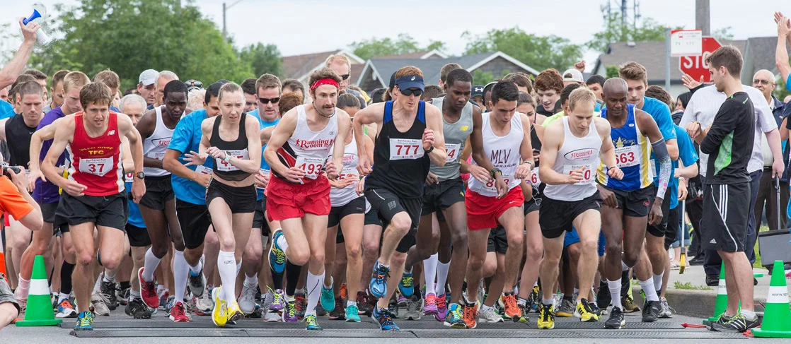 OTTAWA, ON. JUNE 8, 2013 -- Participants in the Barrhaven Run for Roger's House 10k spring into action. The event, which included a 2.5k, 5k and 10k run, attracted over 1,500 runners of all ages and raised $27,000 for Roger's House on Saturday, July 8, 2013 at Longfields-Davidson Heights Secondary School in Nepean. (Leslie Schachter/Barrhaven Independent)