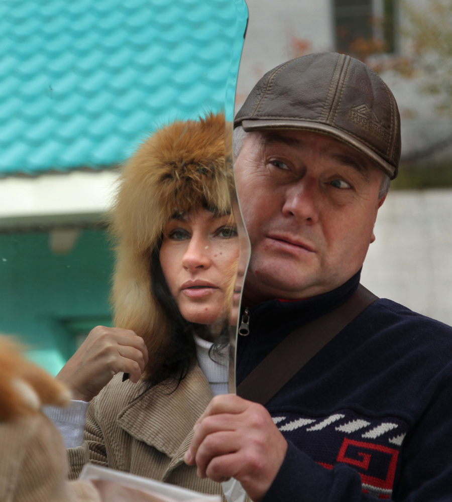 Fur hat salesman near Kirin, Buryatia, Siberia
