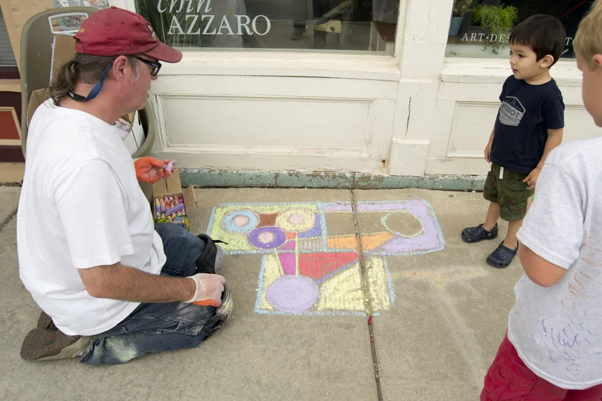 Tim Householder beautifying the sidewalk. 