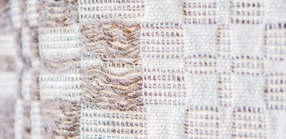 Hand spun fibers make for the incredible textures in the new batch of blankets.