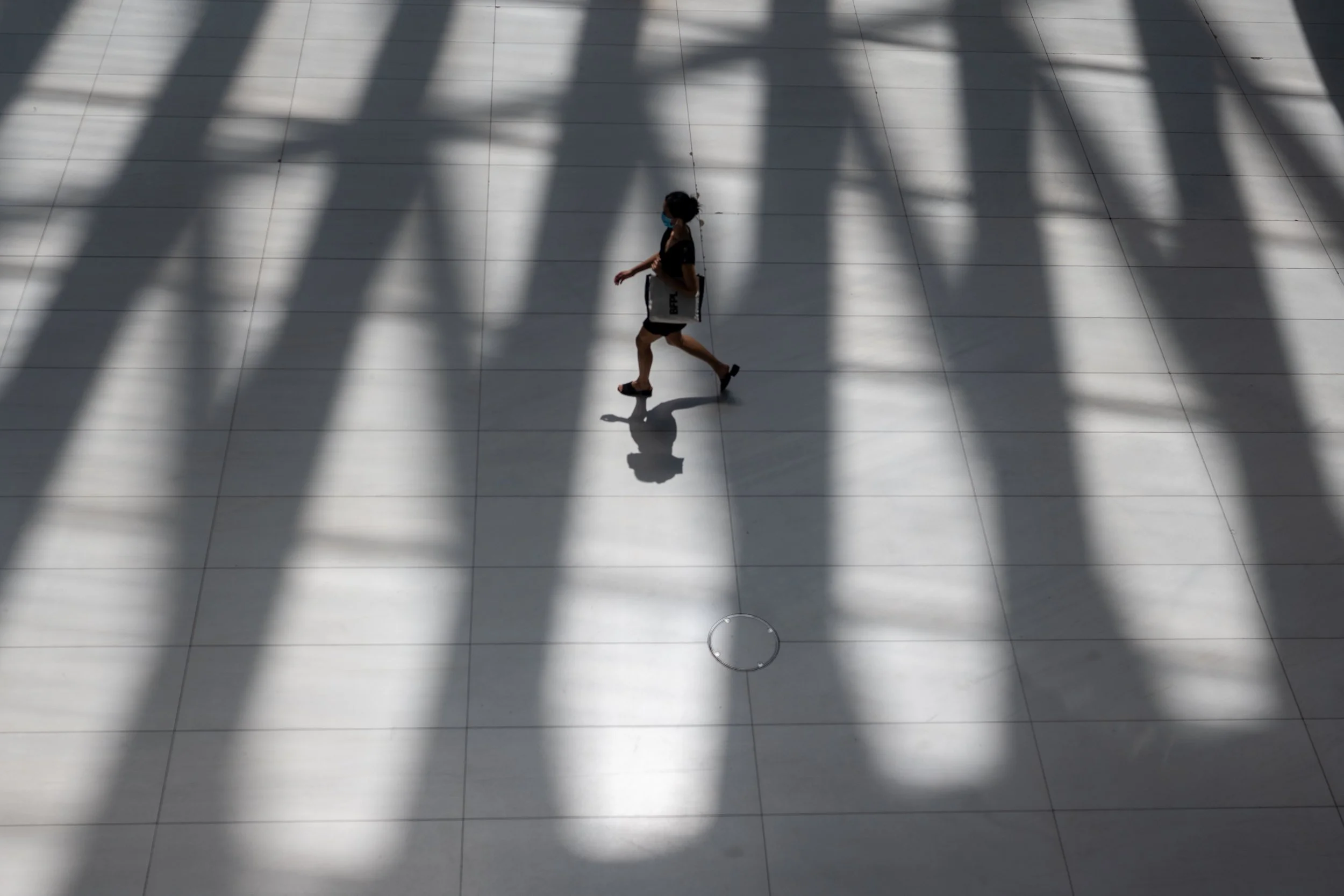 Walking in shadow at The Oculus