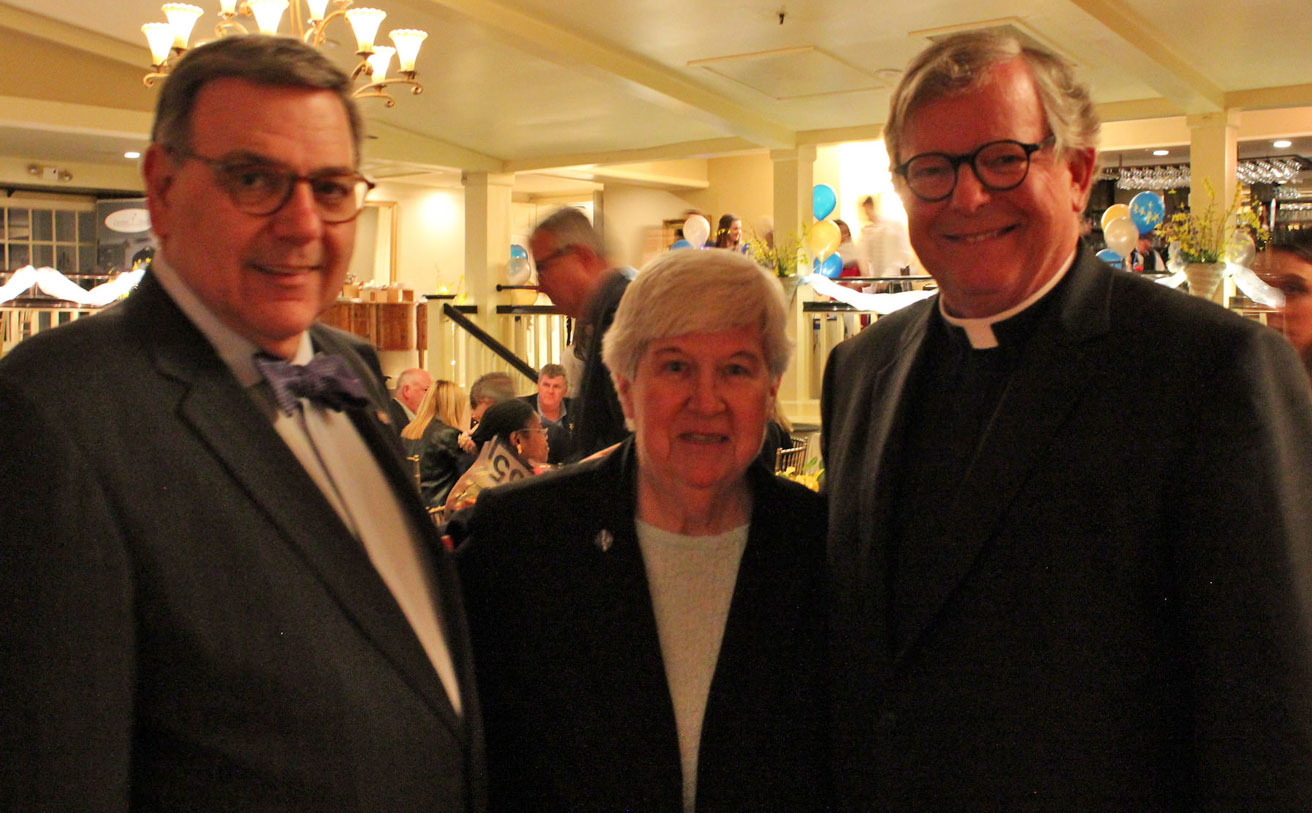 From left are Sacred Heart University President Dr. John J. Petillo, Caroline House Executive Director Peg Regan, SSND, and Fairfield University President Rev. Jeffrey von Arx, S.J.