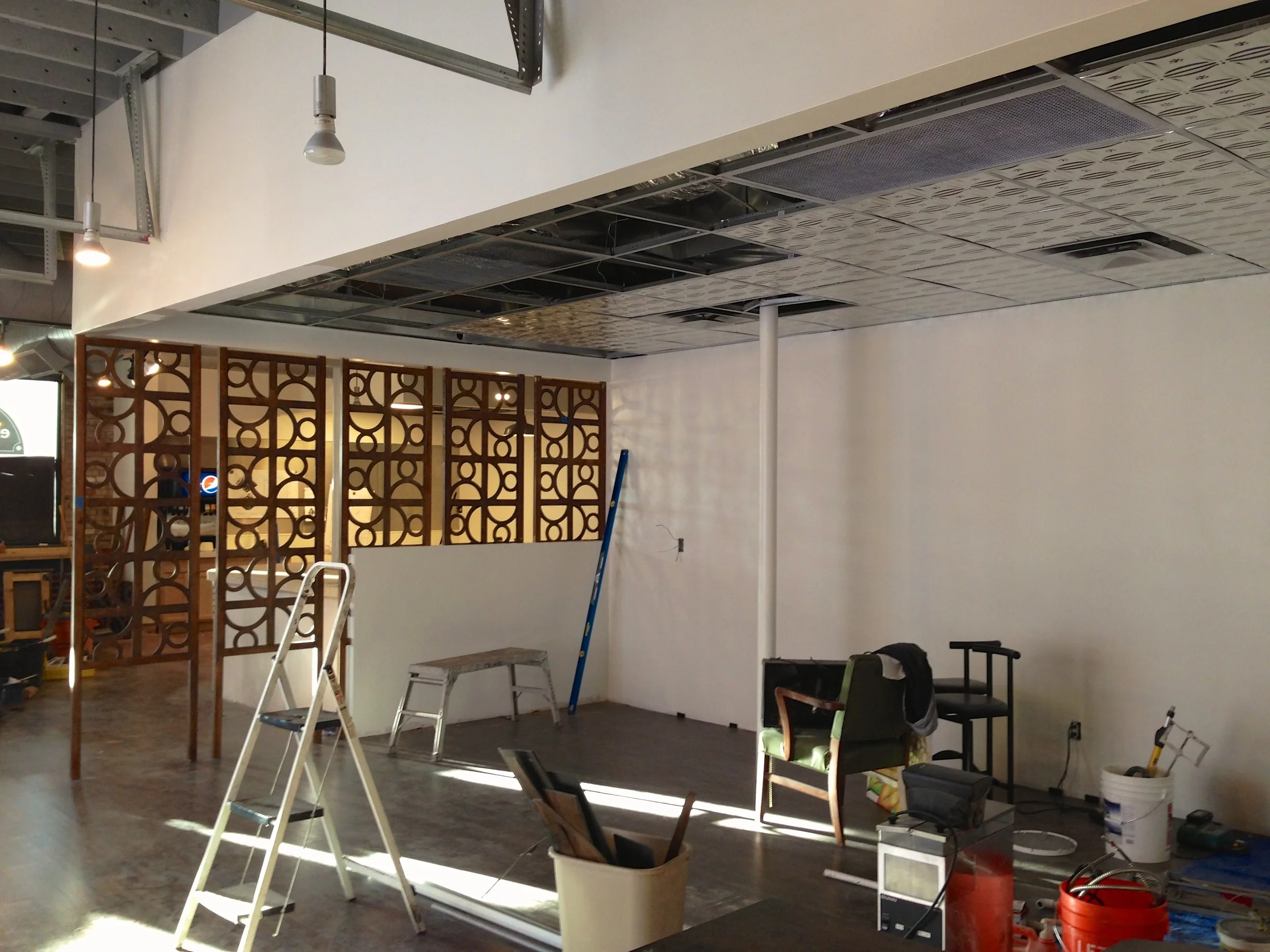 Decorative panels go up during construction.