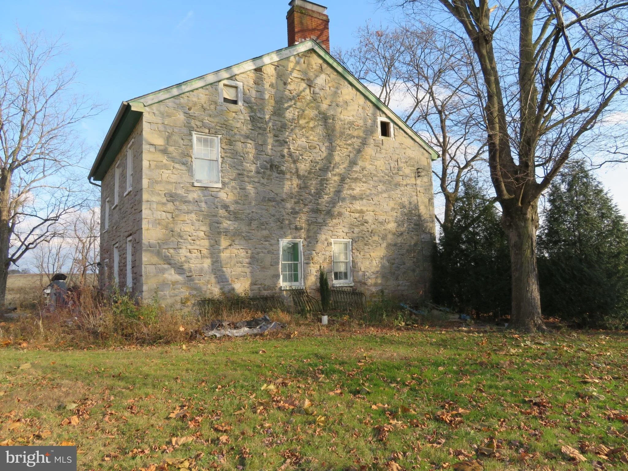  You can see the missing windows in the attic here. Image from  here . 