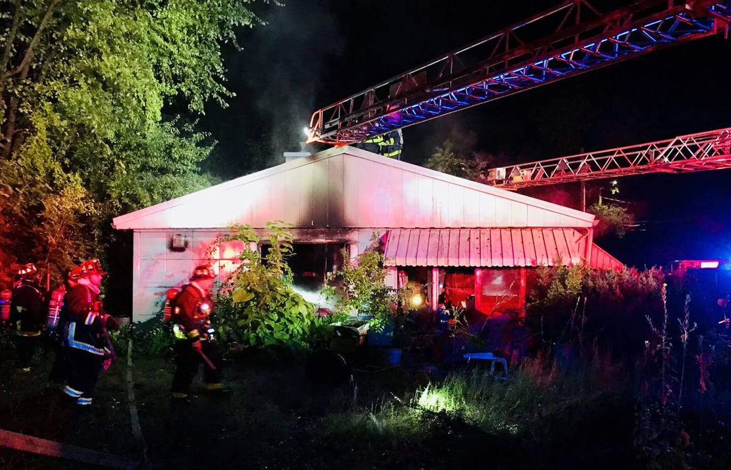  59 Chellman St. BOSTON FIRE DEPARTMENT. Via  Boston Globe . 