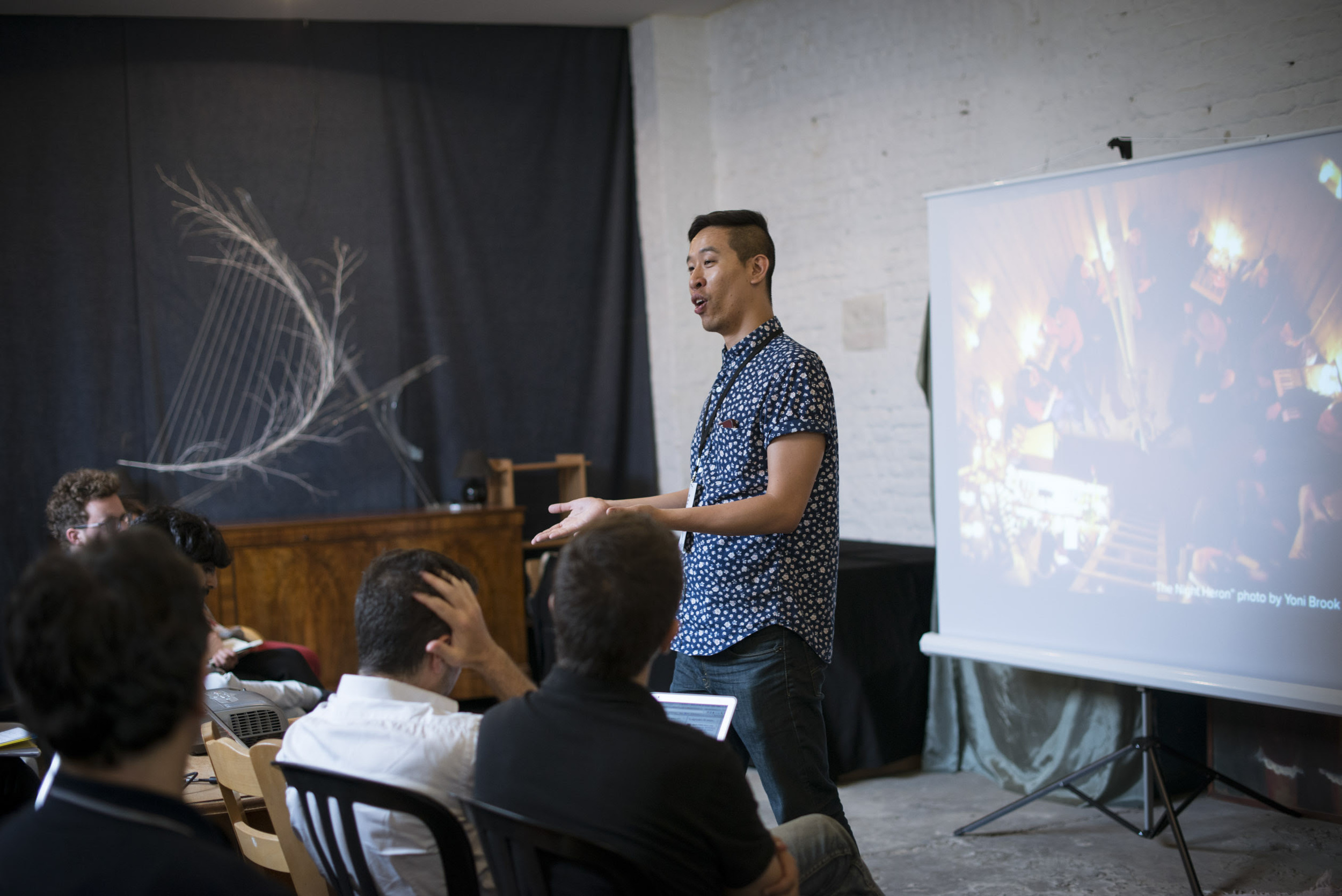 Lee-Sean Huang, cofounder & creative director of Foossa and trustee & treasurer of the Awesome Foundation NYC presenting a workshop on Building Networks for Good at the CAPS2015 Conference in Brussels, Belgium on July 7th. The slide on the screen features the work of Sextant.Works , an Awesome Foundation grantee. 