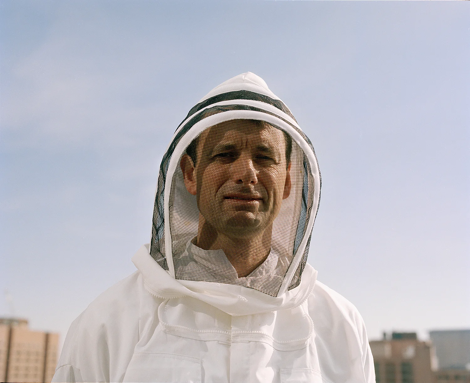 Rooftop Beekeeper, Boston. 2012.