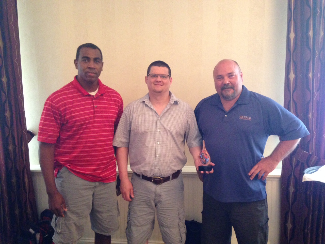 APM Leadership team during the Q Award presentation, pictured from left to right: Reggie Fields, Ben Jonas and Gary Vanderloo.