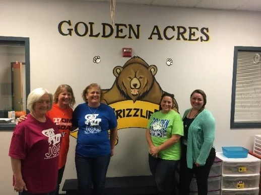 Golden Acres Elementary school Principal and Assistant Principal and other various school office workers.