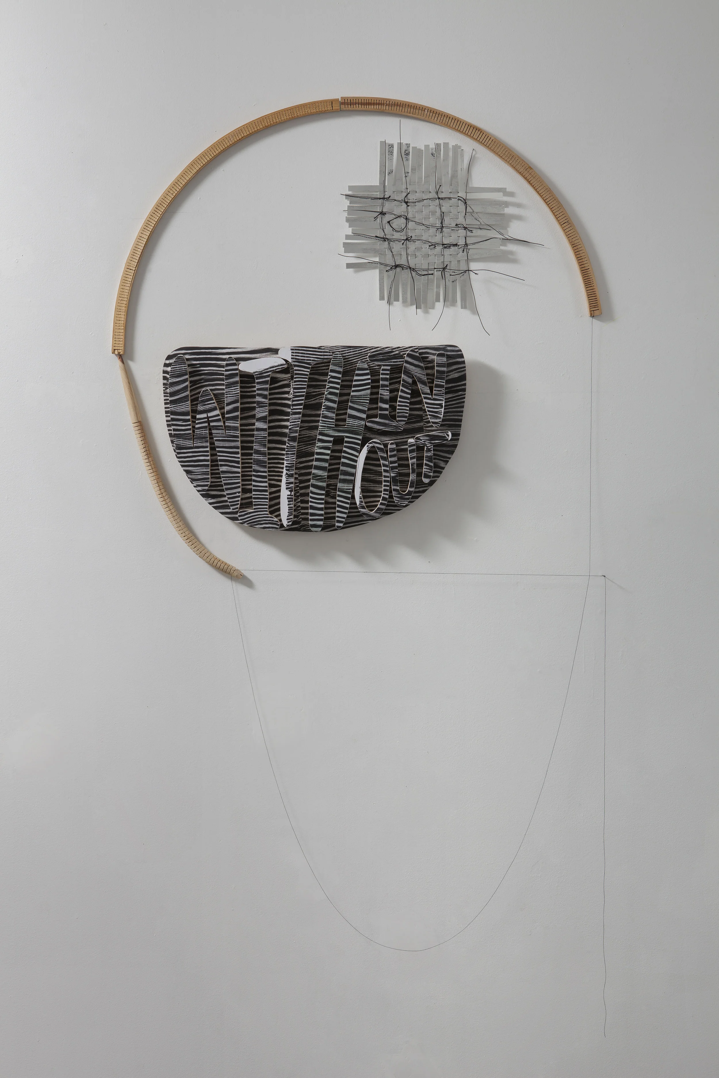 Within, Without , 2017 Installation - dimensions variable reflective tape on paper, wire, wood, photocopies on wood