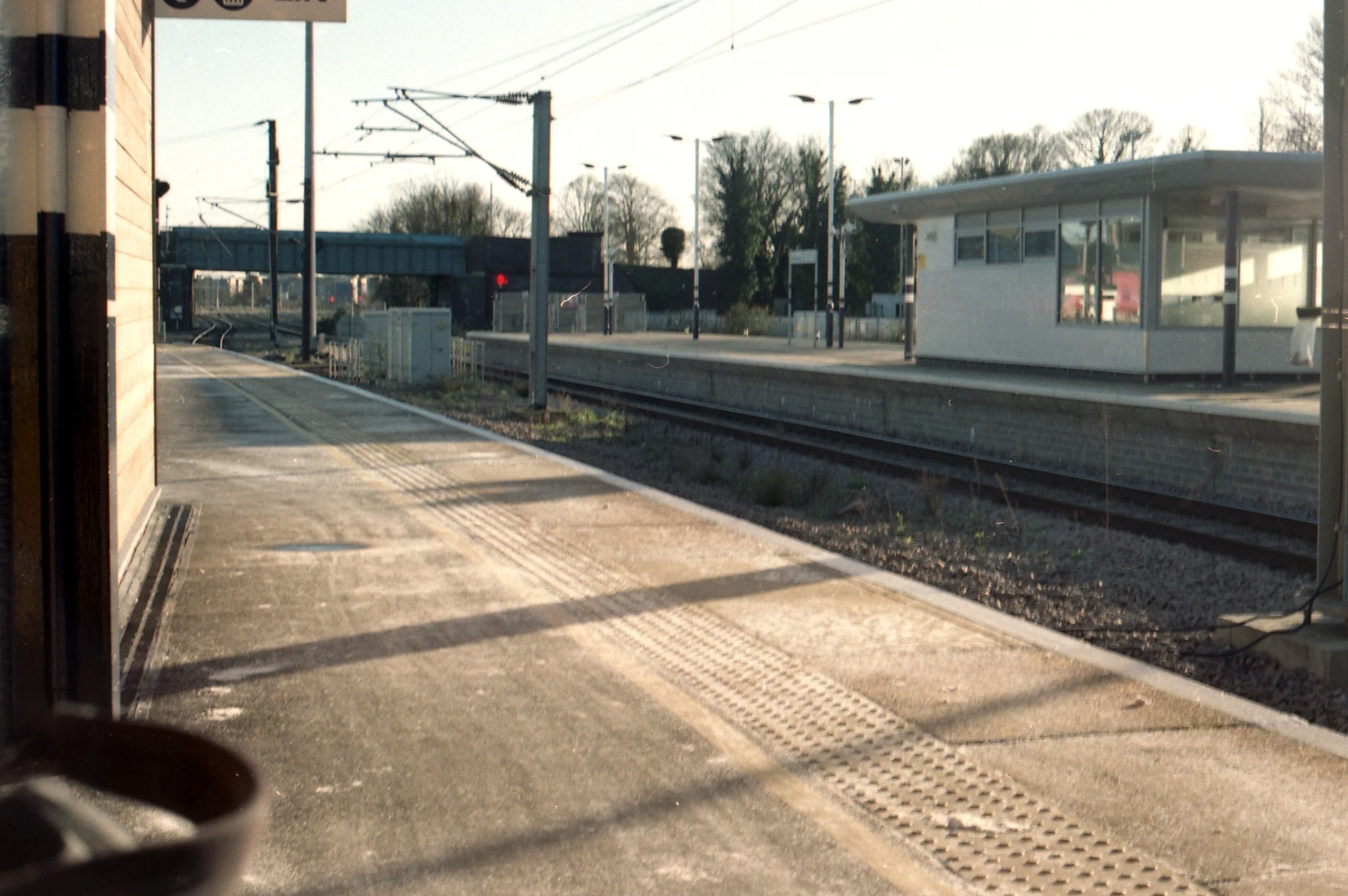 15/366 - Waiting for my next train in Peterborough in the sunshine. What you can't see is the very large tea I also had as it was freezing!
