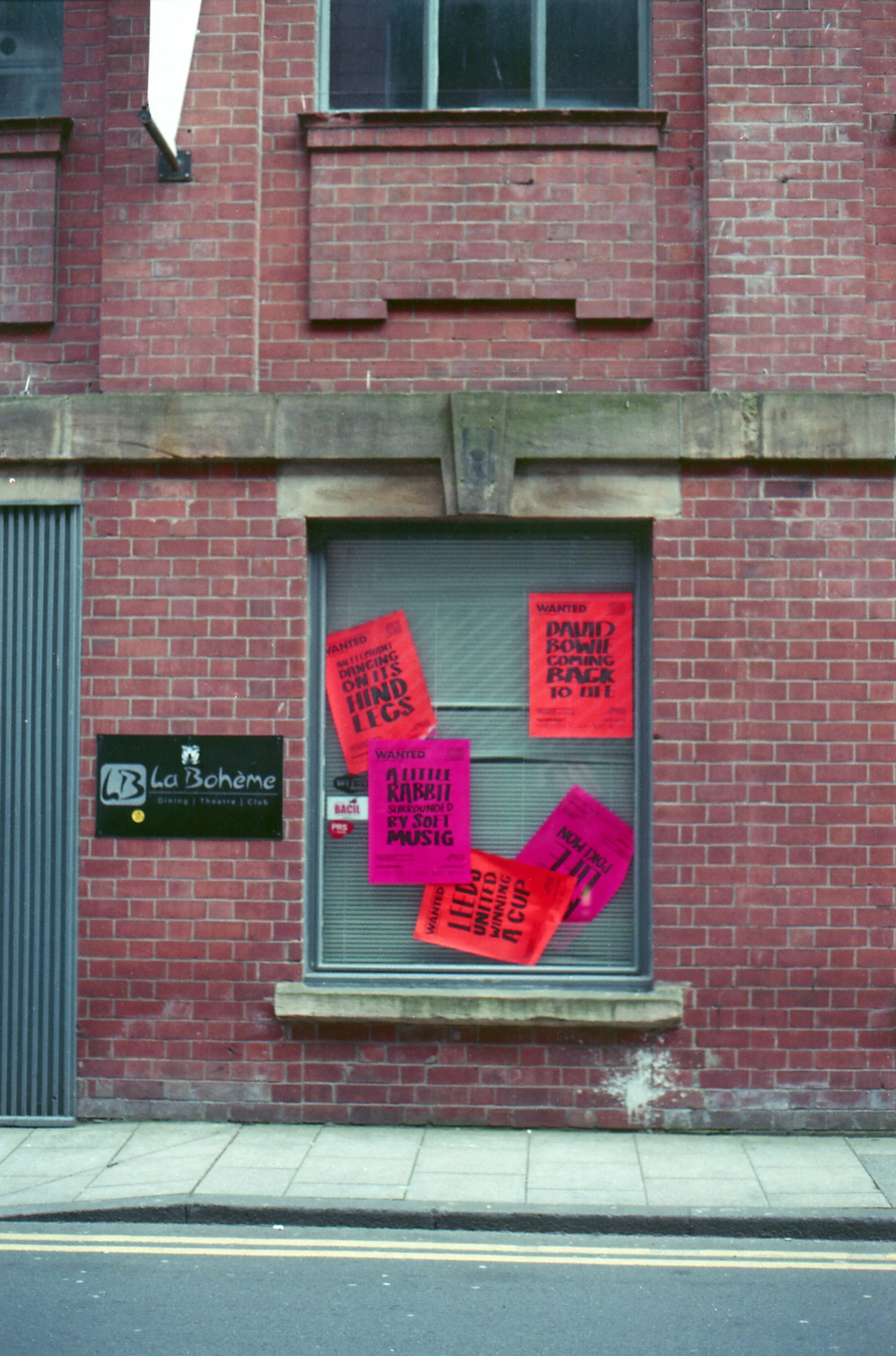 133/366 - I keep seeing these posters around but never so many in one spot.