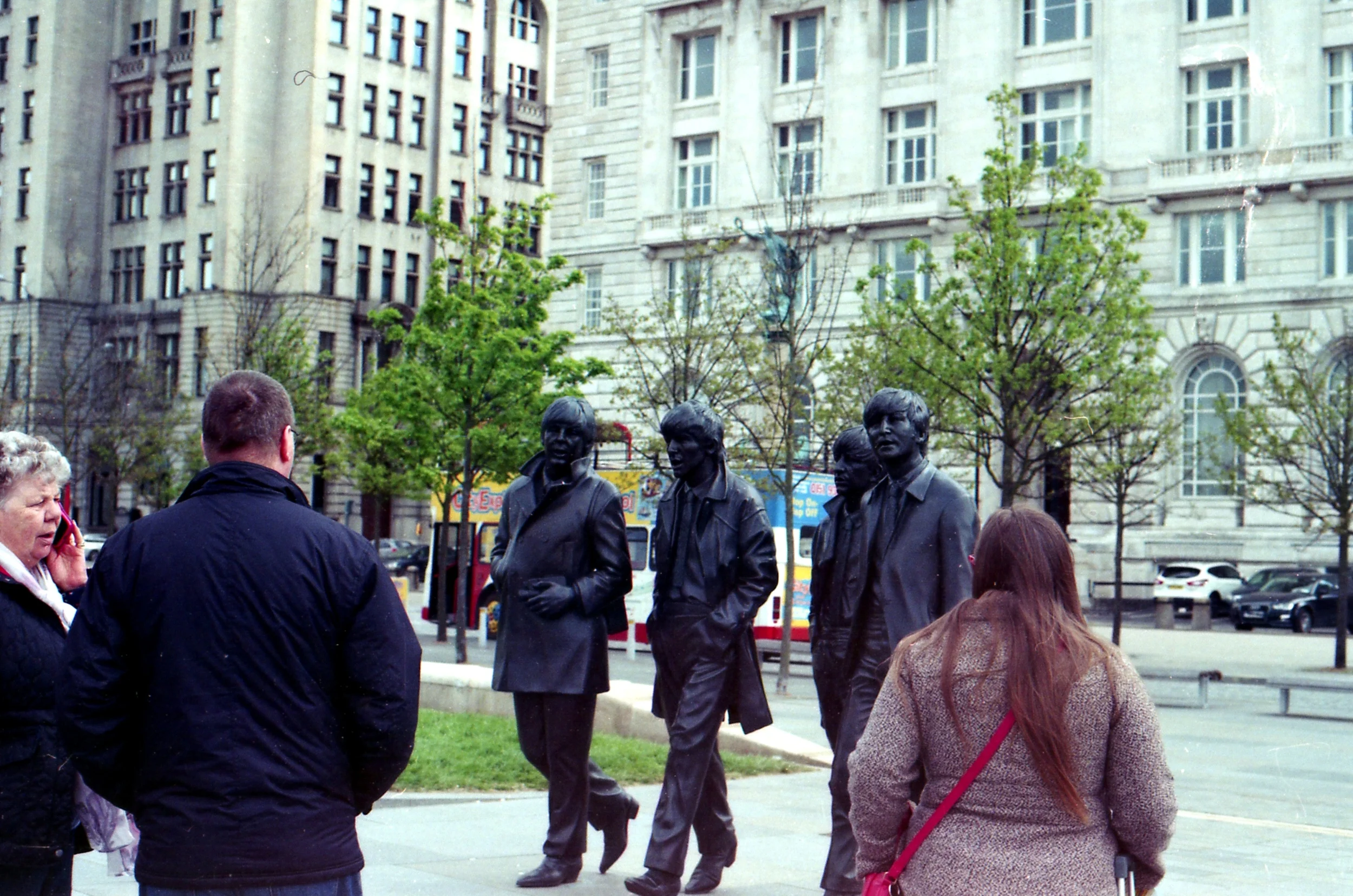 137/366 - As we went to Everton on day 136 we spent the night in Liverpool and did a little bit of sight seeing on day 137. I patiently waited a while for people to move away from The Beatles but after realising that there would always be people around them I decided to include them in the photo. I think I like it. 