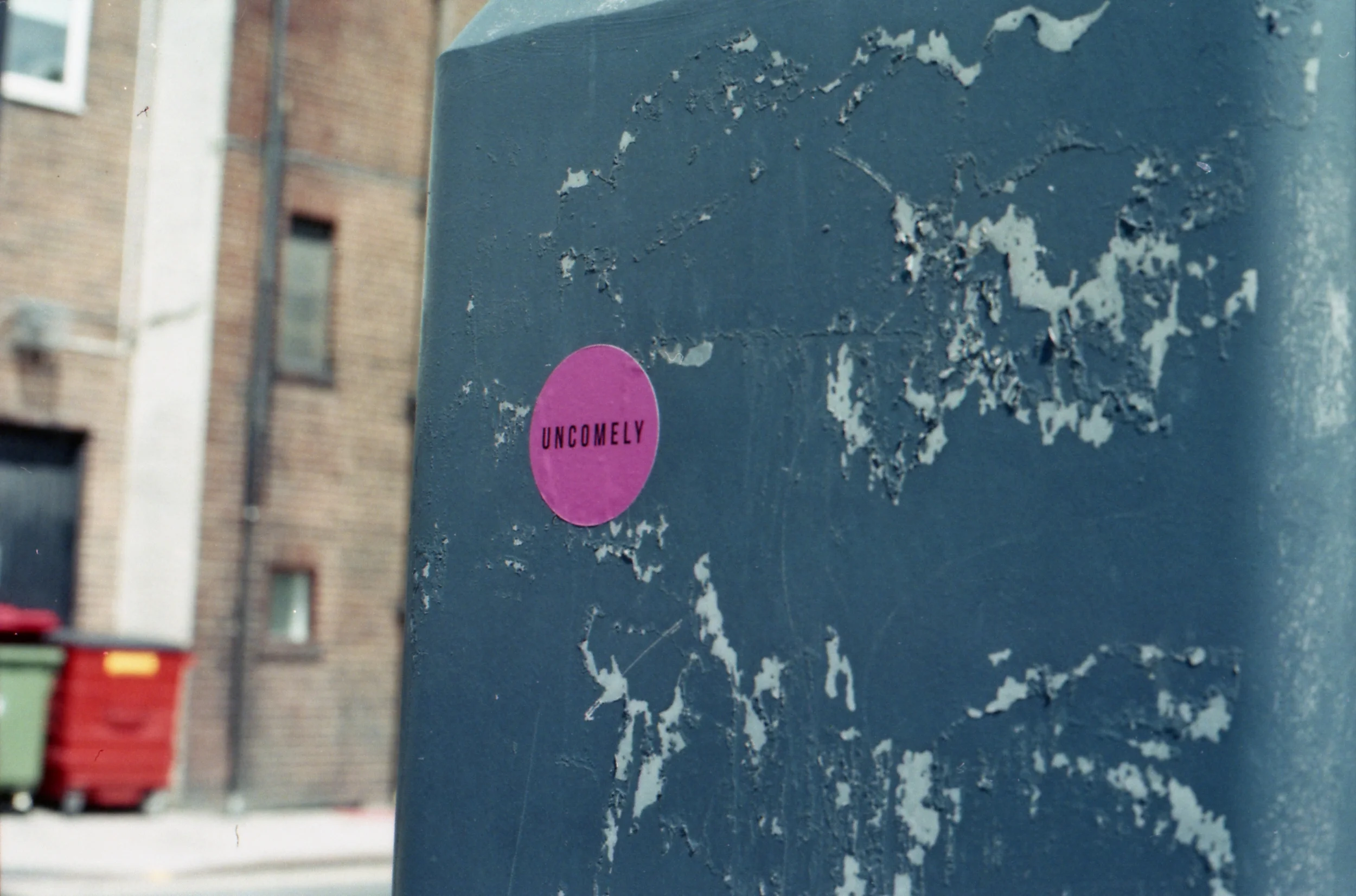 202/366 - Random stickers - perhaps someone didn't approve of the peeling paint?