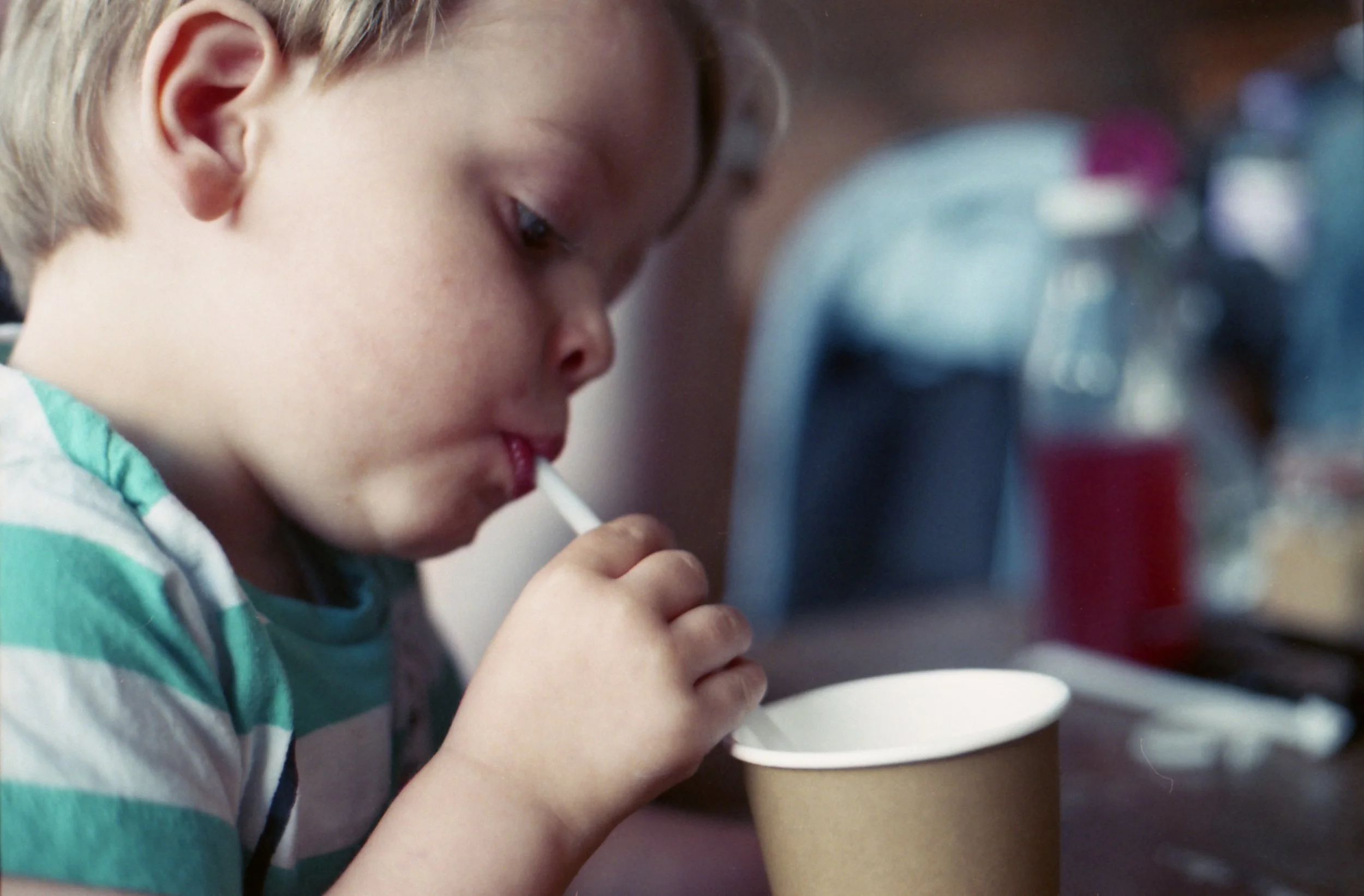 208/366 - My lunch date, we drank juice and played with Buzz Lightyear